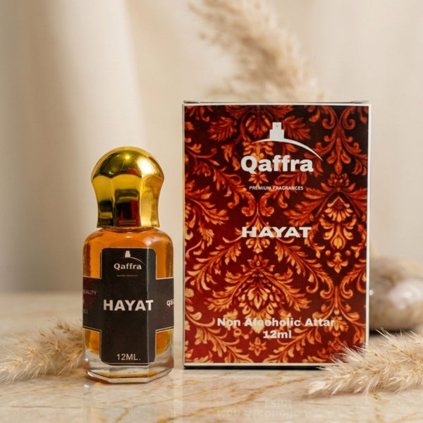 Qaffra Hayat 12ml Attar bottle and packaging box with premium bottle and box on a neutral background