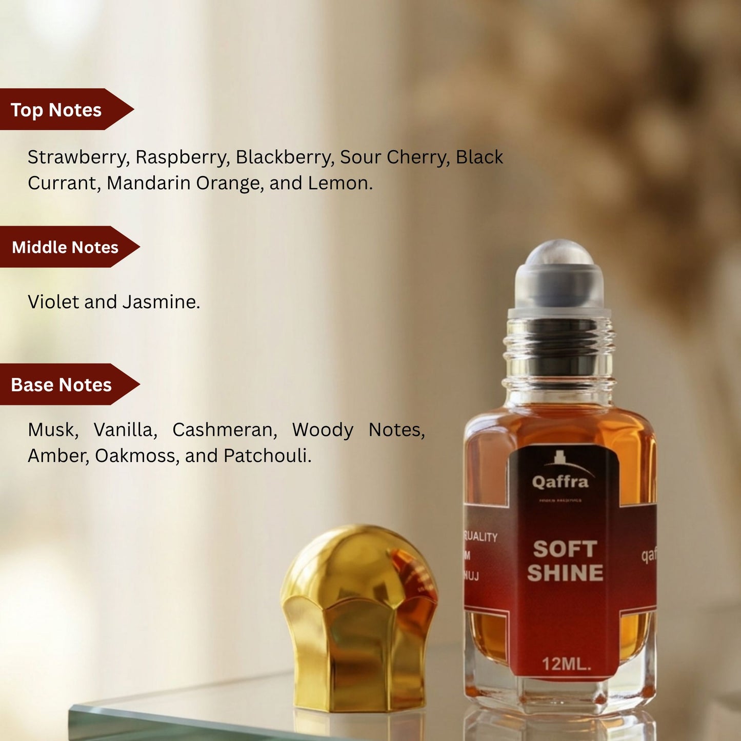 Qaffra Soft Shine 12ml Attar bottle with fragrance notes text on a blurred background